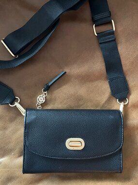 Convertible wallet with a strap